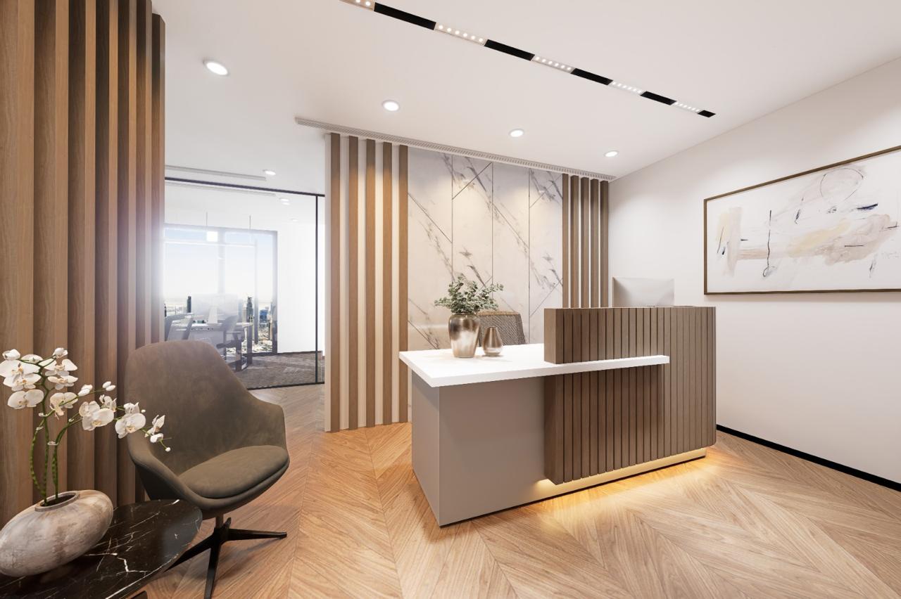 Monde-built reception and front-of-house — custom wood-slatted desk, finished handover