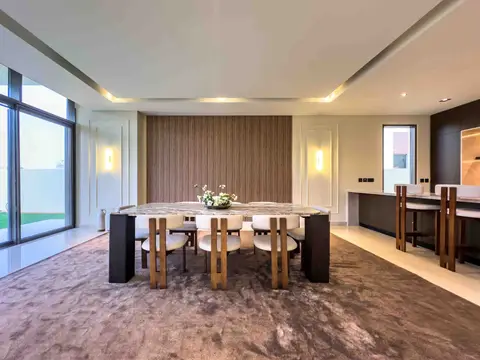 An open-concept dining room features a marble-top table, unique wooden chairs, a wood — Tasaddaq Mughal Technical Services