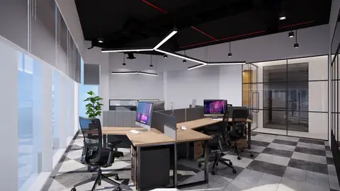 Multiple individual workstations with light wood desks and grey acoustic — INTERIOXPERT TECHNICAL SERVICES CO. L.L.C