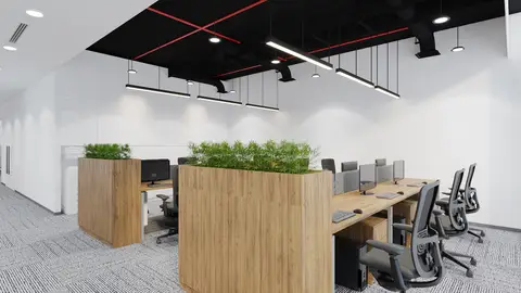 Multiple wooden workstations with integrated green planters, clean white walls — INTERIOXPERT TECHNICAL SERVICES CO. L.L.C