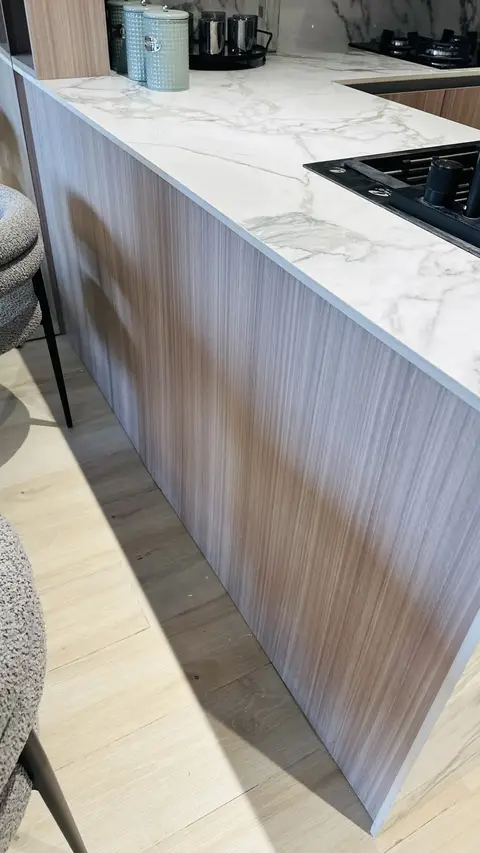 Custom made kitchen island with marble countertop, built in the CLARE workshop
