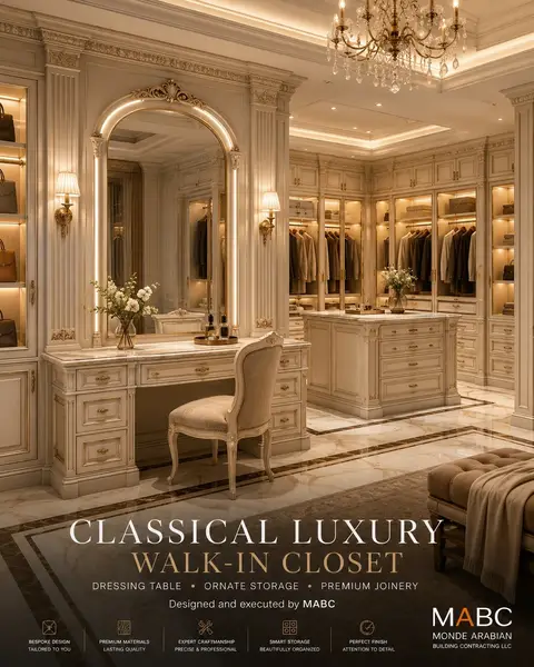 A lavish classical luxury walk-in closet features ornate cream and gold cabinetry, a grand arched mirror with — Monde