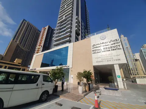 Exterior facade work is under way at the modern high-rise Royal Regency — MINGASH ENGRAVING & ORNAMENTATION WORKS EST.