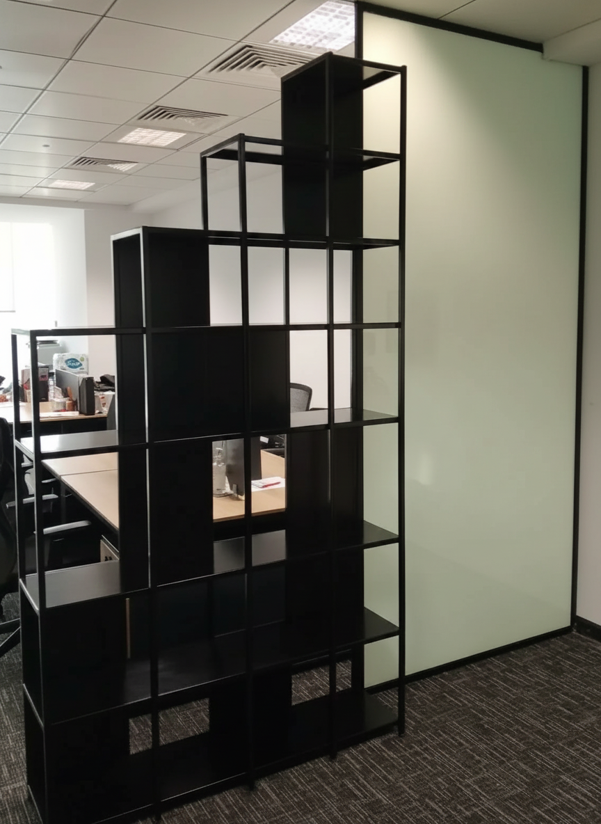 Black metal shelving unit as office room divider
