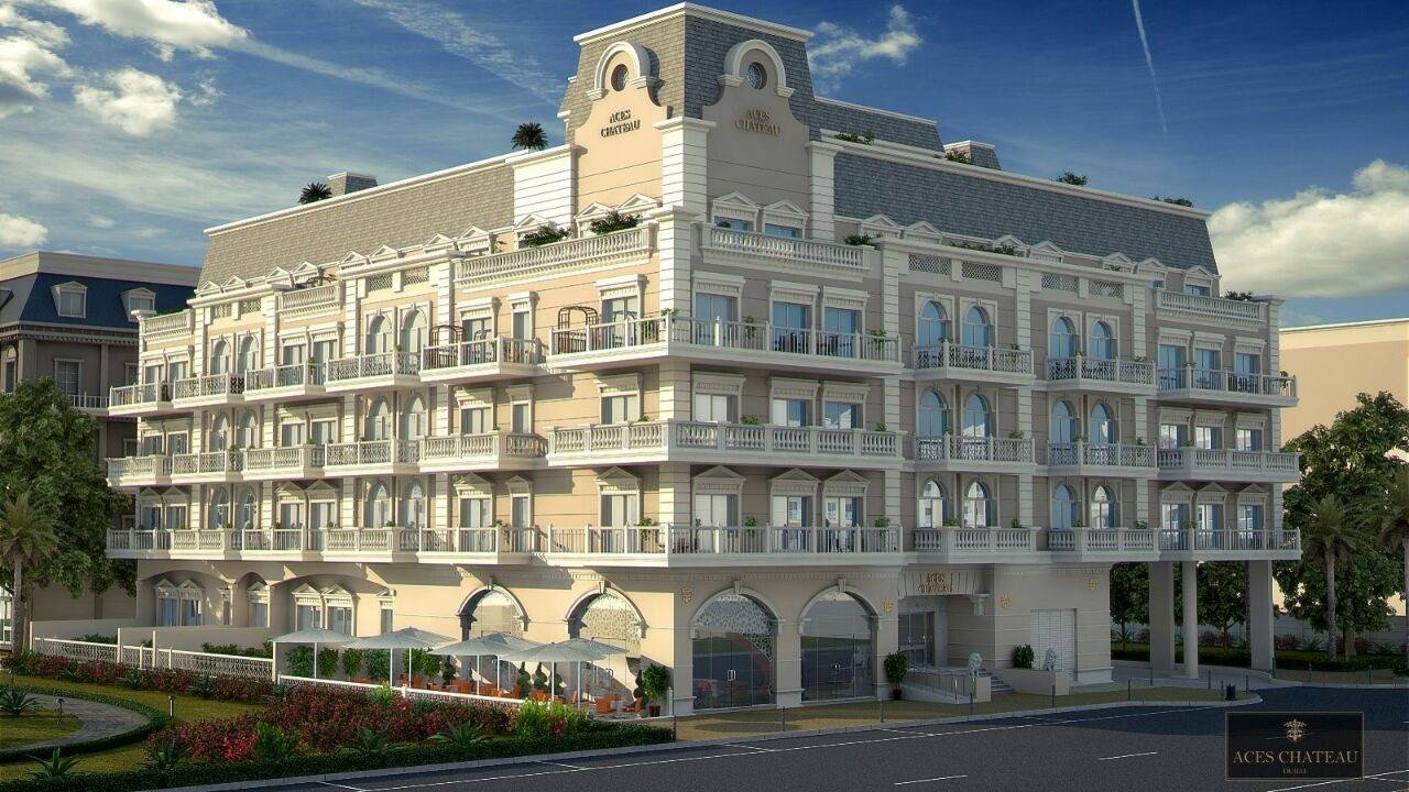 3D render of a grand multi-story building with a cream facade, ornate balustraded balconies, arched windows and a distinctive grey mansard roof