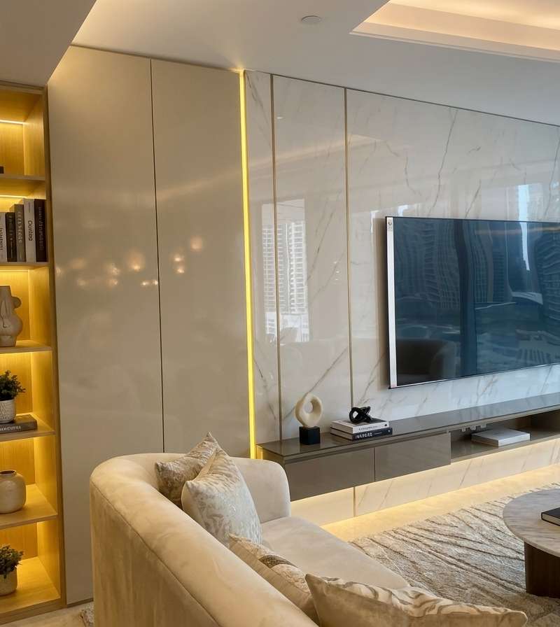 Opulent living room with marble media wall and LED shelving