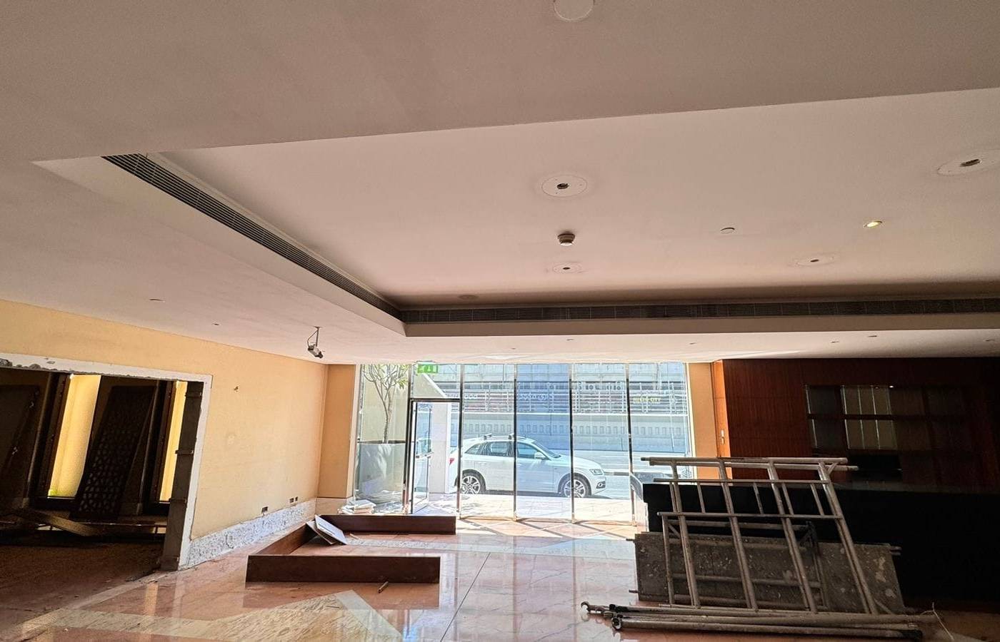 Strip-out and new ceilings — commercial fit-out by Noor Al Sundus Contracting, Dubai