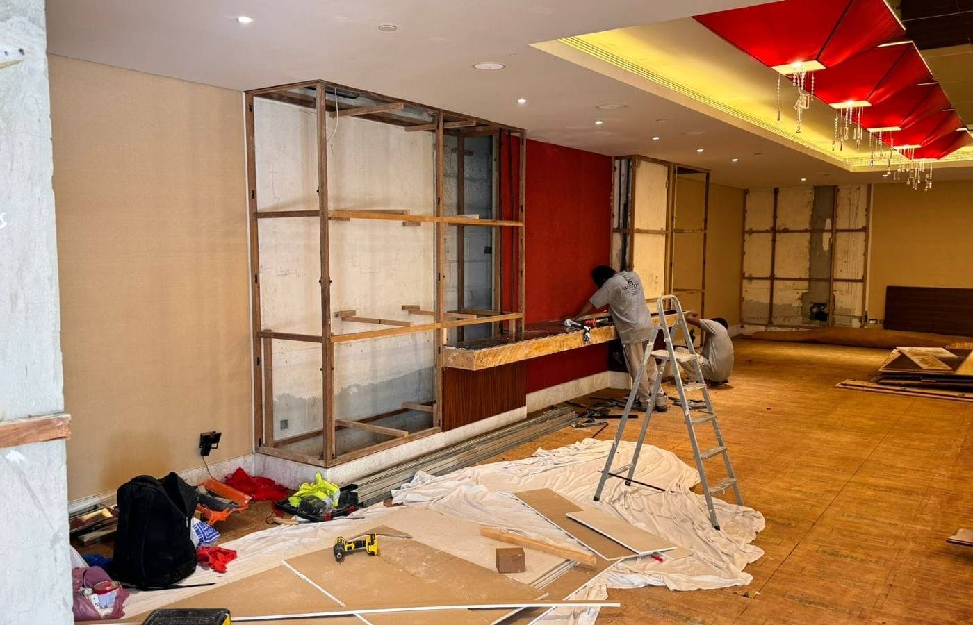 Retail shelving going in — commercial fit-out by Noor Al Sundus Contracting, Dubai