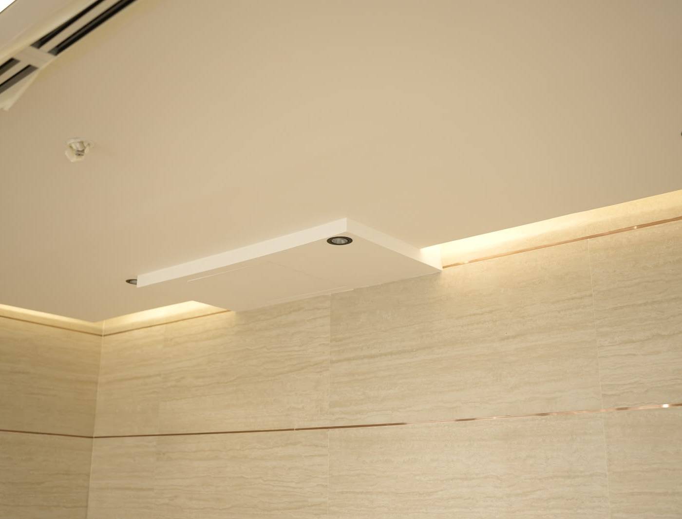 Modern industrial hallway with integrated lighting and ventilation in a warehouse fit out project