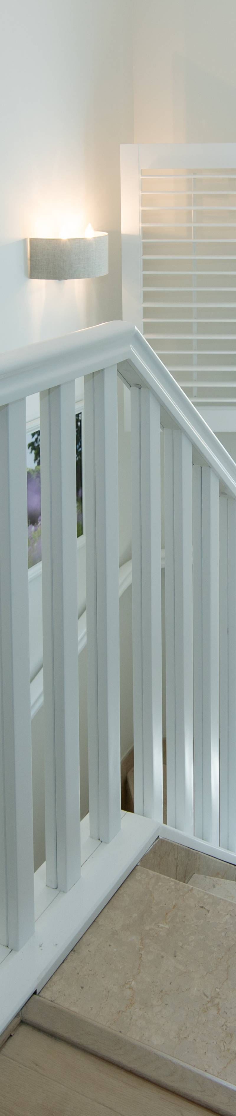 Modern staircase with aluminium windows and natural light