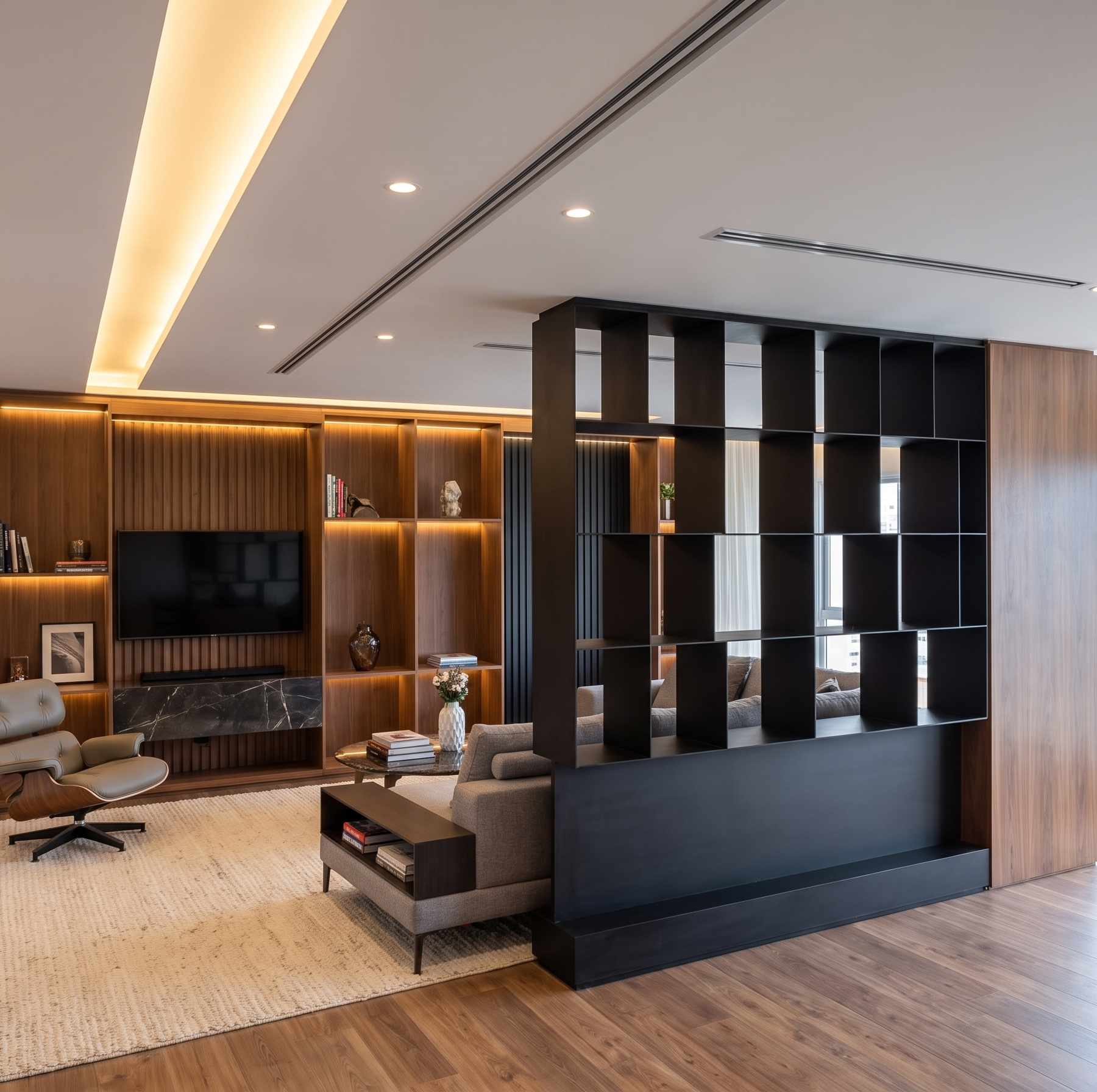 Luxurious open-plan living room with statement chandelier and textured stone wall