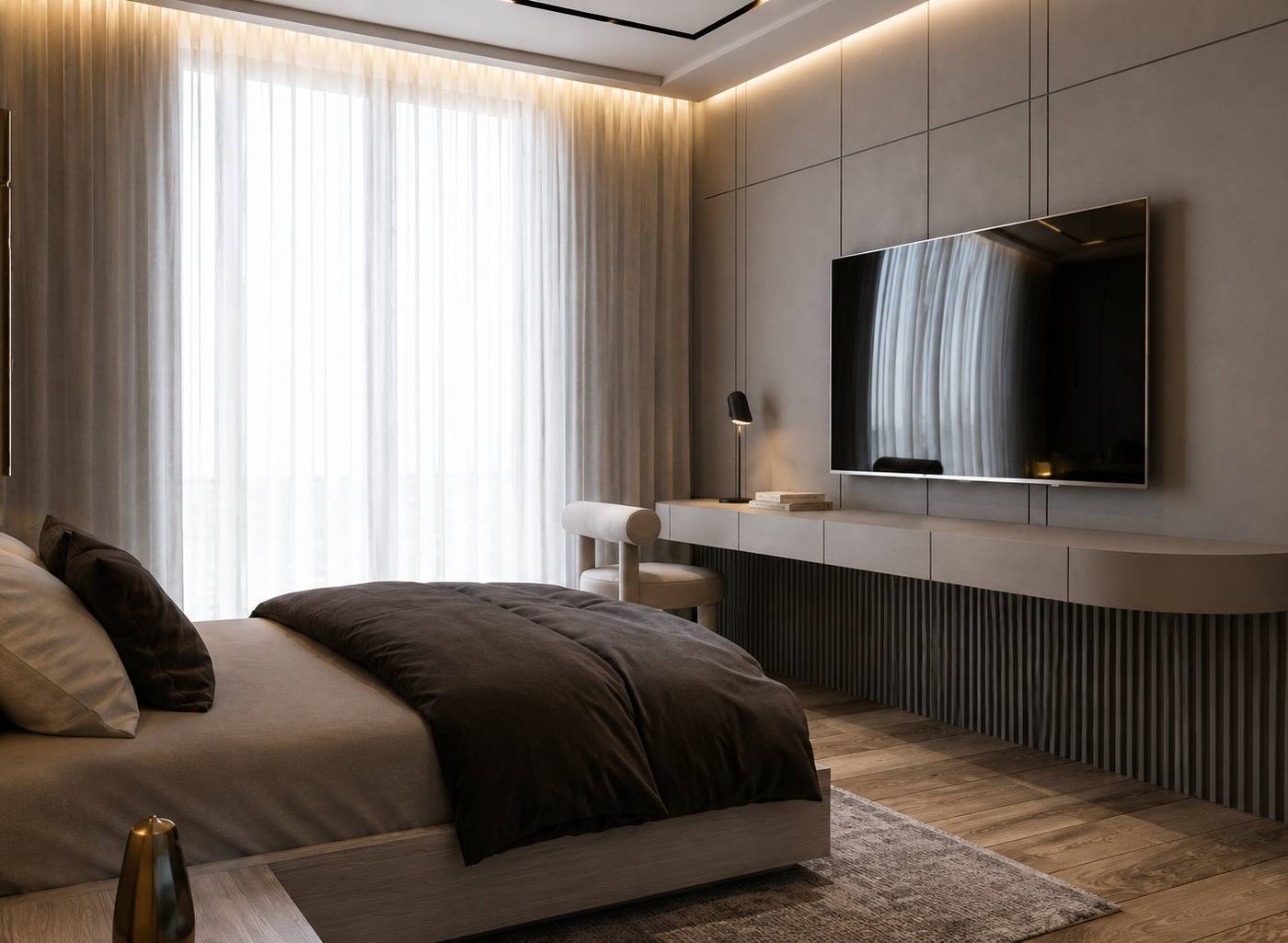 Modern bedroom with integrated floating desk, ribbed paneling, wall mounted television, sheer curtains and warm recessed lighting in a neutral palette with brass accents