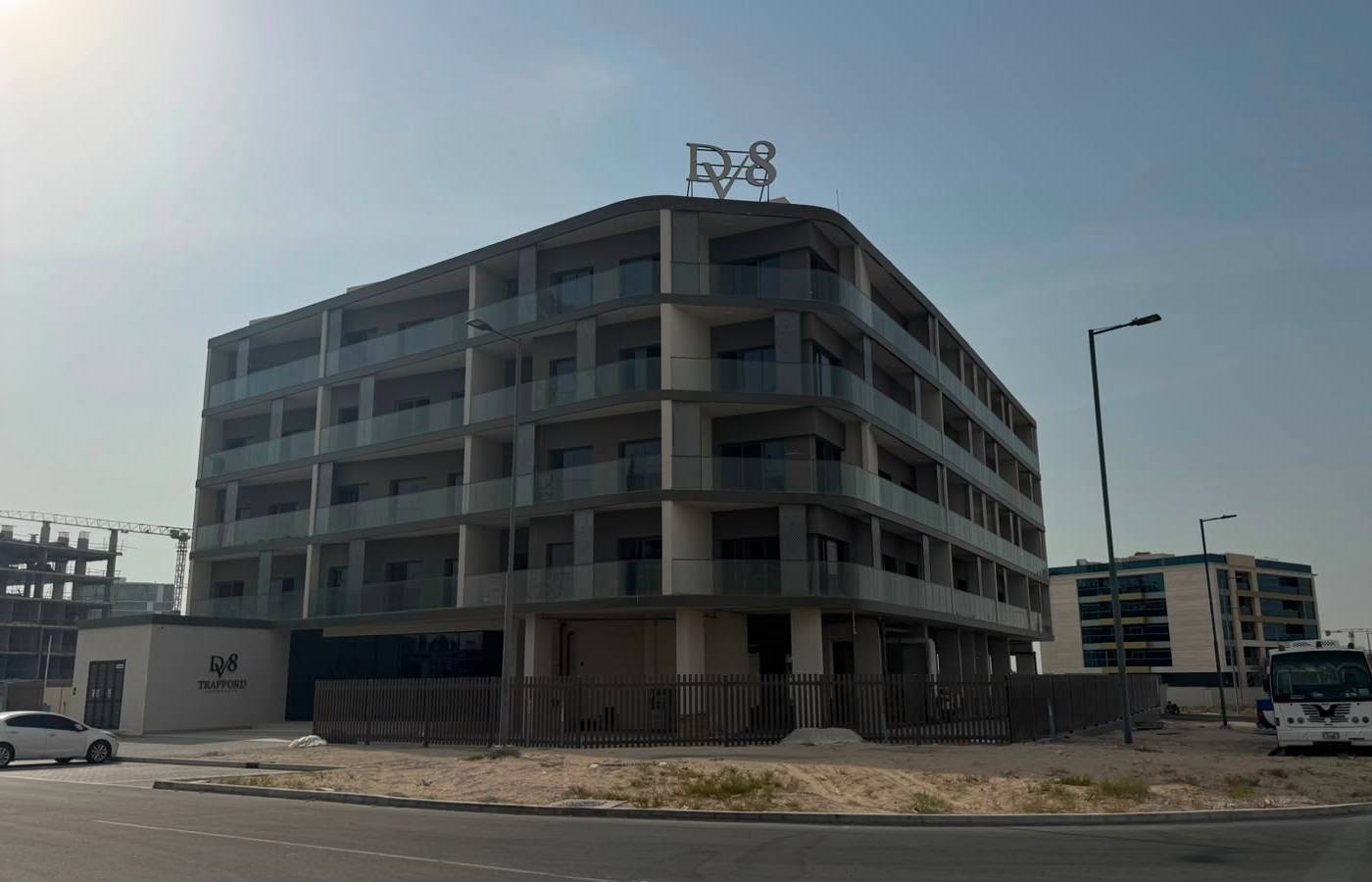 Exterior of D8 Trafford Residences, a modern building type common in Dubai villa communities