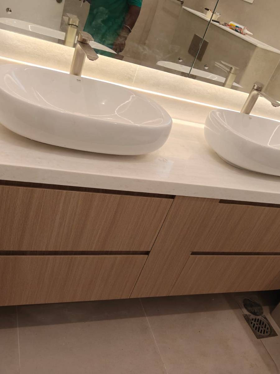 Bathroom vanity by Lacasa Line — oak double unit with stone top and twin vessel basins