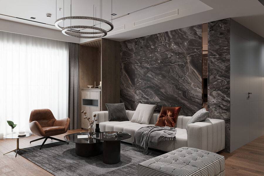 Living room with marble feature wall and chandelier