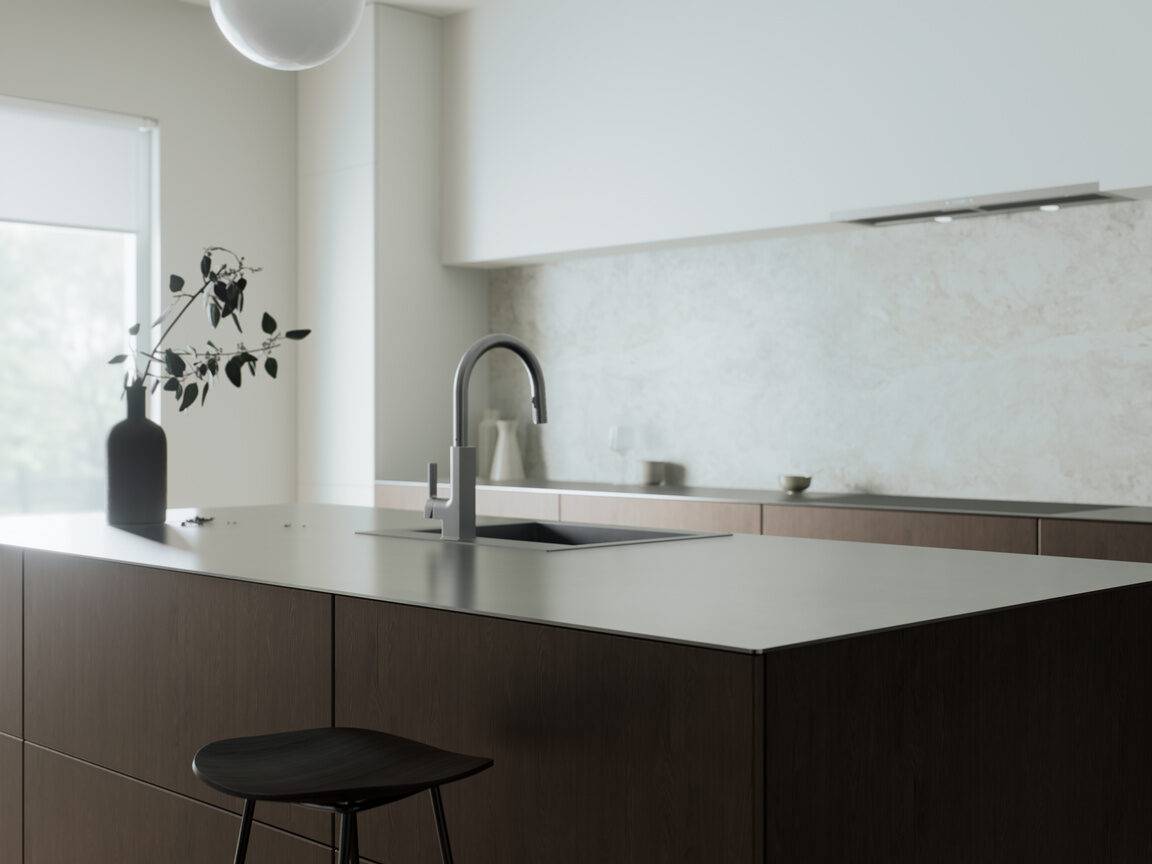 Minimalist marble waterfall counter and finishes